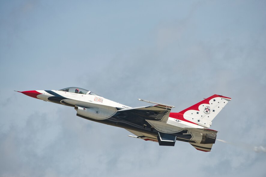 An F-16 Thunderbird Fighting Falcon with the U.S. Air Force Thunderbirds Flight Demonstration Team increases altitude during the Moody Air Force Base, Ga., Legacy of Liberty Open House air show Oct. 26, 2012. During the 2012 season, the Thunderbirds will spend more than 200 days on the road representing Airmen during its 59th year. (U.S. Air Force photo by Senior Airman Douglas Ellis/Released)
