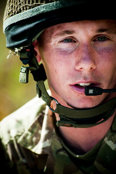 British army Flight Lieutenant Steve Burr, 7th Armored Brigade joint terminal attack controller, communicates with an A-10C Thunderbolt II pilot during Exercise Flying Rhino in South Georgia, Oct. 23, 2012. Burr’s unit spent about two weeks at Moody Air Force Base, Ga., conducting close-air support familiarization training with the 74th and 75th Fighter Squadrons. (U.S. Air Force photo by Staff Sgt. Jamal D. Sutter/Released) 
