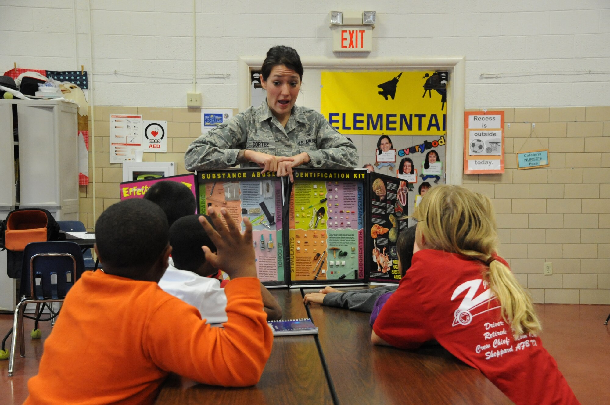 Senior Airman Stephanie Cortez explains what harmful drugs are and the potential negative effects to a group of sixth grade students at Sheppard Elementary school during Red Ribbon week. (U.S. Air Force Photo/Kimberly Parker). 
