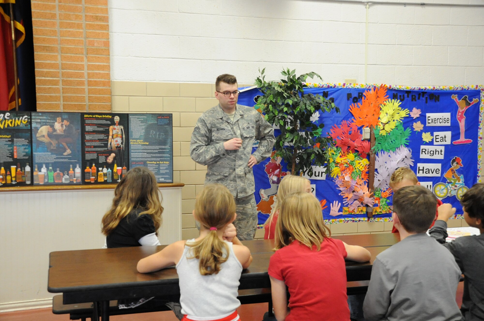 Senior Airman James Beaver explains the negative effects of binge drinking and substance abuse to a group of sixth grade students at Sheppard Elementary School on Oct. 26 during Red Ribbon week. (U.S. Air Force Photo/Kimberly Parker). 