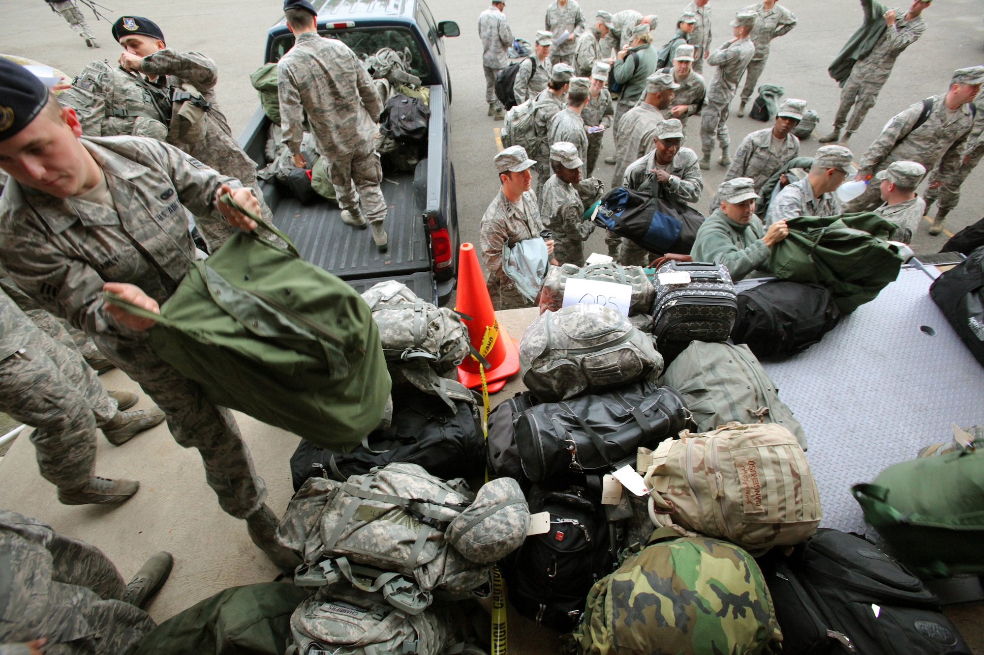 Airmen of the New Jersey National Guard's 108th Wing are processed in at Joint Base McGuire-Dix-Lakehurst, N.J., before being sent out to assist at various emergency shelters prior to the landfall of Hurricane Sandy, Oct. 28, 2012. (U.S. Air Force photo by Master Sgt. Mark C. Olsen/Released