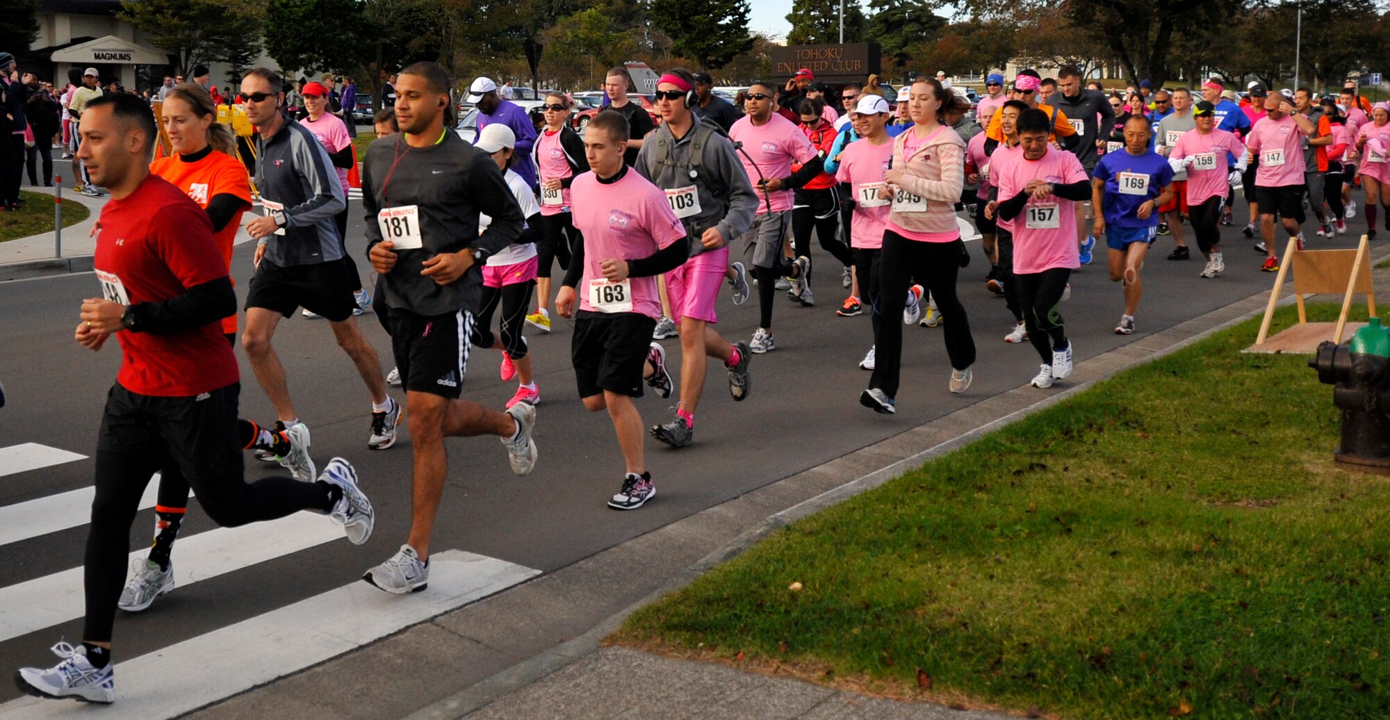 Participants in the Breast Cancer Run 2012 kick off the event at Misawa Air Base, Japan, Oct. 27, 2012. At the event, more than 300 participants had the option to run a 5K, 10K or 15K base perimeter run to help raise breast cancer awareness. (U.S. Air Force photo by Airman 1st Class Zachary Kee)