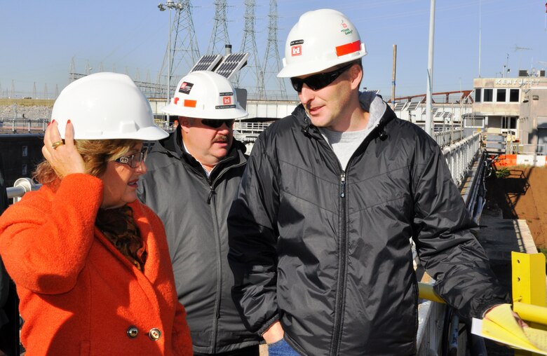 Adam Walker (Right), U.S. Army Corps of Engineers Nashville District project manager for the Kentucky Lock Addition Project, briefs Congressman Diane Black, Tennessee’s 6th Congressional District, on the project during her Oct. 29, 2012 visit with Ingram Barge representatives. Black’s district includes or touches Nashville District’s Center Hill, Cordell Hull, Dale Hollow, Old Hickory, J. Percy Priest and Cheatham Lakes. Mark Abshire (Center), lockmaster at Kentucky and Barkley Locks, briefed Black on Nashville District lock operations. (USACE photo by Fred Tucker)