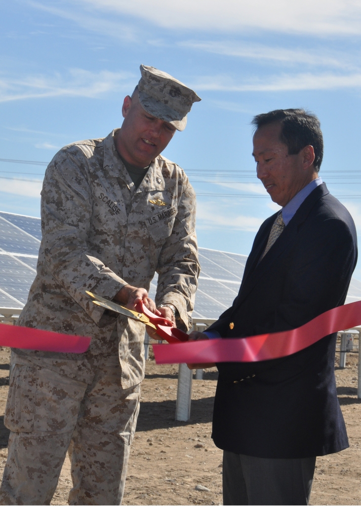 Marine Corps Logistics Base Barstow Commanding Officer, Col. Michael L. Scalise, and Assistant Secretary of the Navy, (Energy, Installation and Environment), Roger Natsuhara, cut the red ribbon, officially opening one of two solar farms aboard the base, Oct. 18. The two sites aboard the base include 2.73 acres on Nebo and 4.82 acres on the Yermo annex of the base.