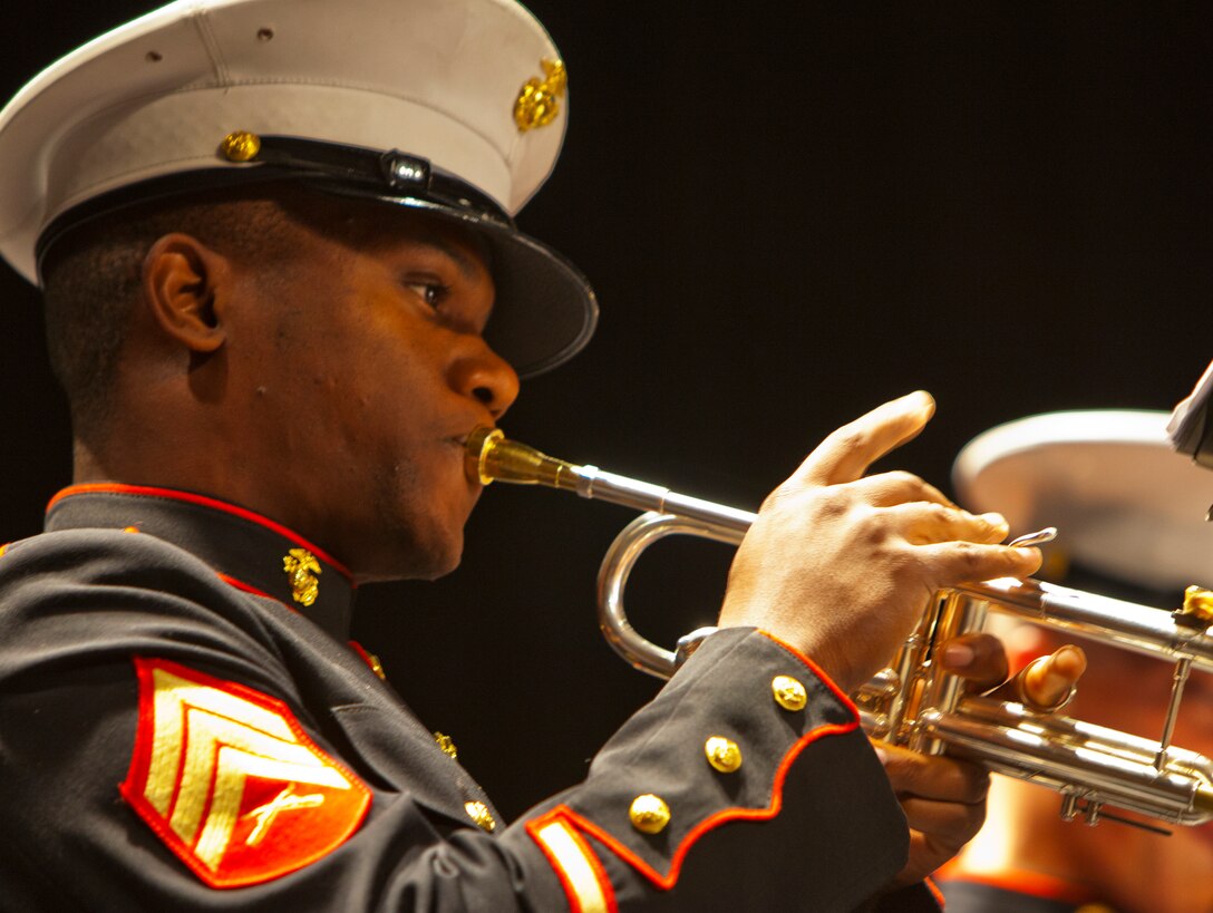 Sgt. Michael Joseph, a trumpeter from the Marine Corps Band New Orleans, plays for students at William Floyd High School in Mastic Beach, N.Y., Oct. 25, 2012.  The band is often called upon to provide musical entertainment in support of Marine Corps recruiting events.  (U.S. Marine Corps Photo by Cpl. Nana Dannsa-Appiah/Released)