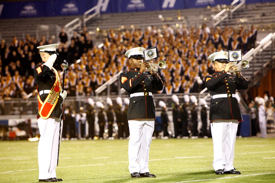 The Marine Corps Band New Orleans closes out their performance with the Marine Corps Hymn during the 2012 Newsday Marching Band Festival at Hofstra University in Hempstead, N.Y., Oct. 25, 2012.  The band is under the control of Marine Forces Reserve and based at Marine Corps Support Facility New Orleans.  (U.S. Marine Corps Photo by Cpl. Nana Dannsa-Appiah/Released)