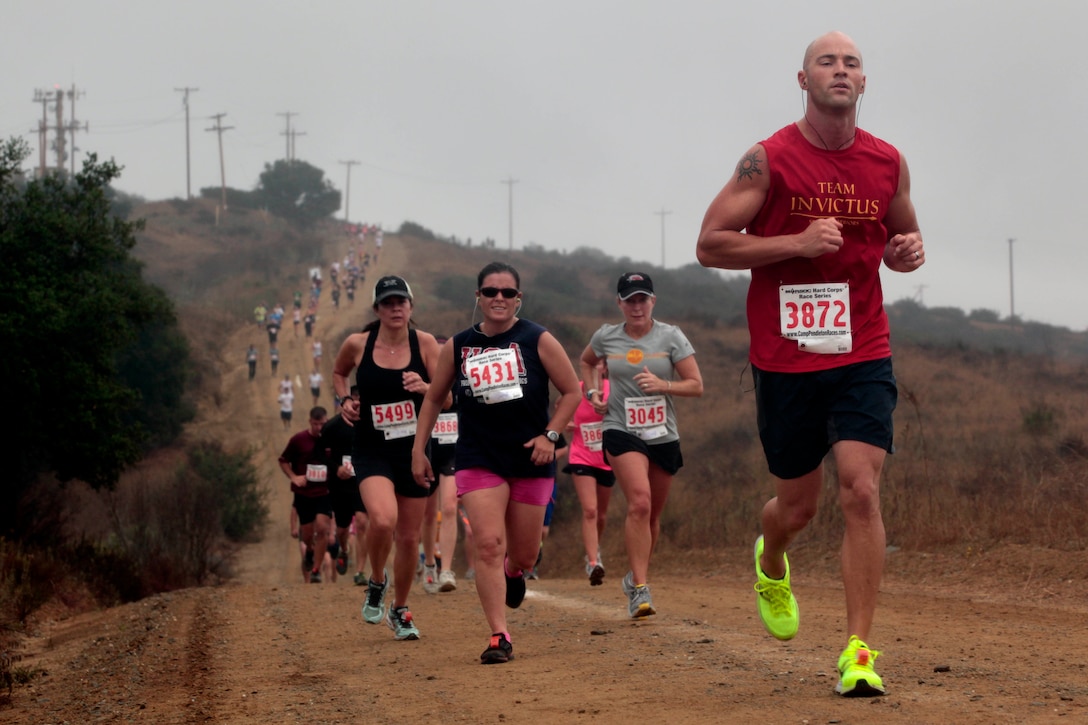 A group of competitors speed through the 10K course during the 2012 Camp Pendleton Hard Corps Race Series, Buffalo Alley 10K race here, Oct. 20. The event allowed participants to run through backcountry trails where thriving herds of American Bison, commonly known as buffalo, still roam.