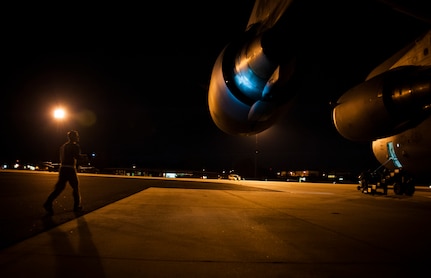 Capt. Mike Lewis, 305th Air Mobility Wing C-17 Globemaster III pilot from Joint Base McGuire-Dix-Lakehurst, N.J., performs pre-flight checks before departing from Joint Base Charleston to return to JB MDL to assist with Hurricane Sandy relief efforts Oct. 31, 2012. C-17 Globemaster IIIs from JB MDL and Dover Air Force Base, Del., landed here over the weekend because of the intensity of Hurricane Sandy affecting the Northeast. (U.S. Air Force photo/Senior Airman Dennis Sloan)