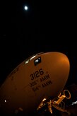 Crew members with the 305th Air Mobility Wing from Joint Base McGuire-Dix-Lakehurst, N.J., perform pre-flight checks on their C-17 Globemaster III before departing from Joint Base Charleston, S.C., to return to JB MDL to assist with Hurricane Sandy relief efforts Oct. 31, 2012. C-17 Globemaster IIIs from JB MDL and Dover Air Force Base, Del., landed here over the weekend because of the intensity of Hurricane Sandy affecting the Northeast. (U.S. Air Force photo/Senior Airman Dennis Sloan)