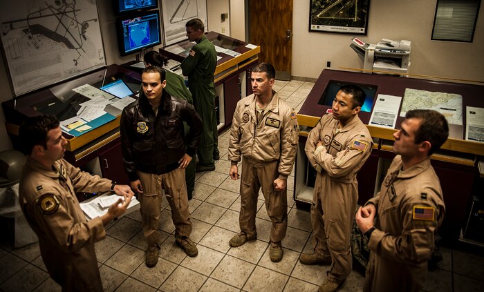 Capt. Robert Deland, 305th Air Mobility Wing C-17 Globemaster III pilot from Joint Base McGuire-Dix-Lakehurst, N.J., briefs the crew before departing from Joint Base Charleston to return to JB MDL to assist with Hurricane Sandy relief efforts Oct. 31, 2012. C-17 Globemaster IIIs from JB MDL and Dover Air Force Base, Del., landed here over the weekend because of the intensity of Hurricane Sandy affecting the Northeast. (U.S. Air Force photo/Senior Airman Dennis Sloan)