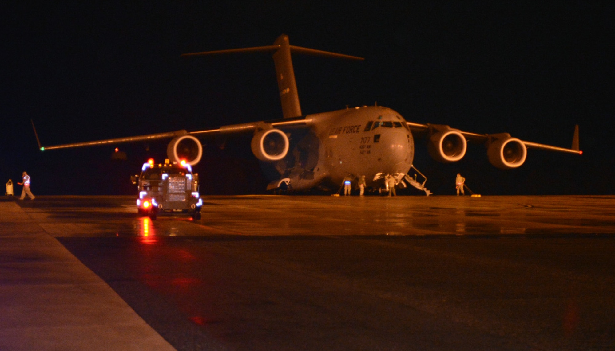 A C-17 Globemaster III taxies on the runway Oct. 30, 2012 on the flightline at Dover Air Force Base, Del. The C-17 returned from Joint Base Charleston, S.C. where it was evacuated to during Hurricane Sandy. (U.S. Air Force photo by Tech. Sgt. Chuck Walker)