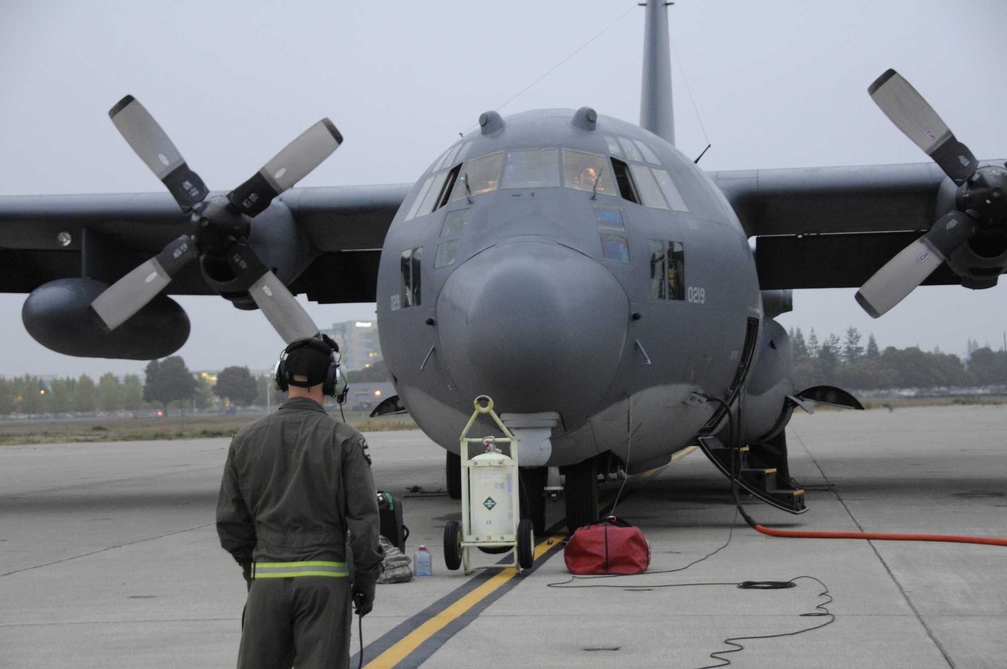 A California Air National Guard aircrew from the 130th Rescue Squadron conducts preflight check on an MC130P Combat Shadow at Moffett Federal Airfield, Calif., Oct 29, 2012.  More than 100 guardsmen from the 129th Rescue Wing  prepare to mobilize to the East Coast to assist with Hurricane Sandy rescue efforts.  Two MC-130P Combat Shadow aircraft, two HH-60G Pave Hawk rescue helicopters and two Guardian Angel Pararescue teams mobilized to the East Coast to provide life-saving rescue capabilities to those in need in the aftermath of Hurricane Sandy.  (Air National Guard photo by Tech. Sgt. Ray Aquino/RELEASED)