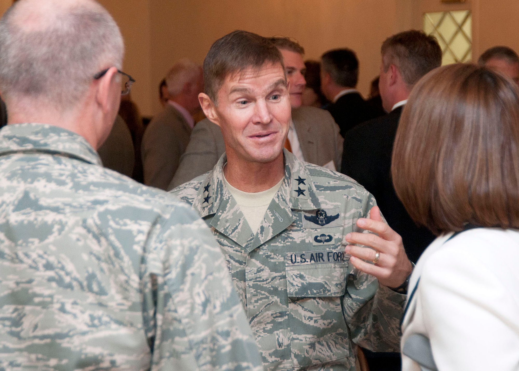 HANSCOM AIR FORCE BASE, Mass. - Maj. Gen. Craig Olson, C3I and Networks program executive officer, talks with attendees at the Hanscom Representatives Association luncheon meeting at Hanscom’s Minuteman Commons Oct. 25. Olson spoke about working together and the importance of trust-based relationships during his presentation to the group. (U.S. Air Force Photo by Mark Wyatt)
