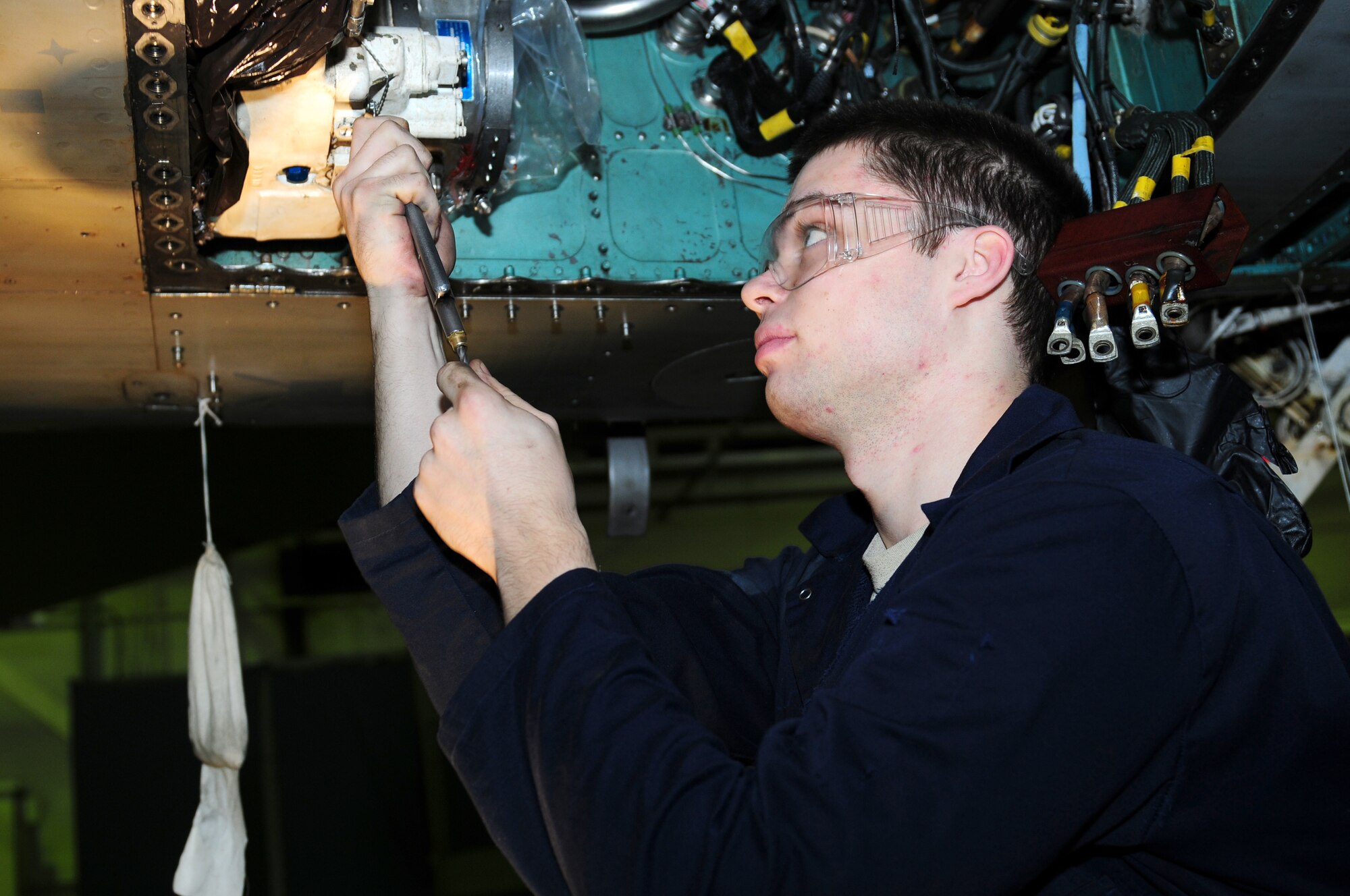 ROYAL AIR FORCE LAKENHEATH, England - Airman 1st Class Patrick Hange, 48th Equipment Maintenance Squadron inspection section apprentice, performs maintenance on an F-15E Strike Eagle Oct. 31, 2012. Hange was nominated for a Liberty Spotlight because he displays the core value of “Service Before Self.” (U.S. Air Force photo by Airman 1st Class Cory D. Payne)