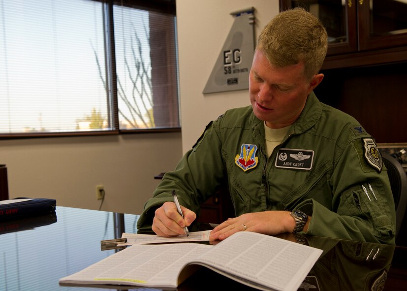 Colonel Andrew Croft, 49th Wing commander, fills out a donation form for the 2012 Combined Federal Campaign at Holloman Air Force Base, N.M., Oct. 30. The CFC raises millions of dollars each year for eligible non-profit organizations that provide health and human service benefits throughout the world. The goal for Holloman AFB this year is $120,000.  The drive ends Nov. 21, and the goal is currently 45 percent met. For more information on the CFC, contact your unit representative, Maj. Damien Pavlik at 572-1860, or 2nd Lt. David Leonard at 572-4056. (U.S. Air Force photo by Senior Airman DeAndre Curtiss/Released) 