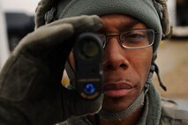 MISSILE COMPLEX, N.D. -- Airman 1st Class Tavarus Roberts, 791st Missile Security Forces Squadron response force leader, utilizes a Laser Rangefinder as part of his task in establishing a site defense plan at a launch facility. As a maintenance security escort team member, he formulates security plans and procedures designed to respond to any security situation should one arise. (U.S. Air Force photo/Senior Airman Jose L. Hernandez)