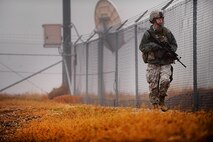 MISSILE COMPLEX, N.D. -- Senior Airman Summer Soards, 791st Missile Security Forces Squadron response force leader, conducts a security perimeter check at a launch facility, Oct. 22. As a member of the squadron's maintenance security escort teams, Soards is responsible for overseeing the security of  sites when the facility is undergoing maintenance. (U.S. Air Force photo/Senior Airman Jose L. Hernandez)