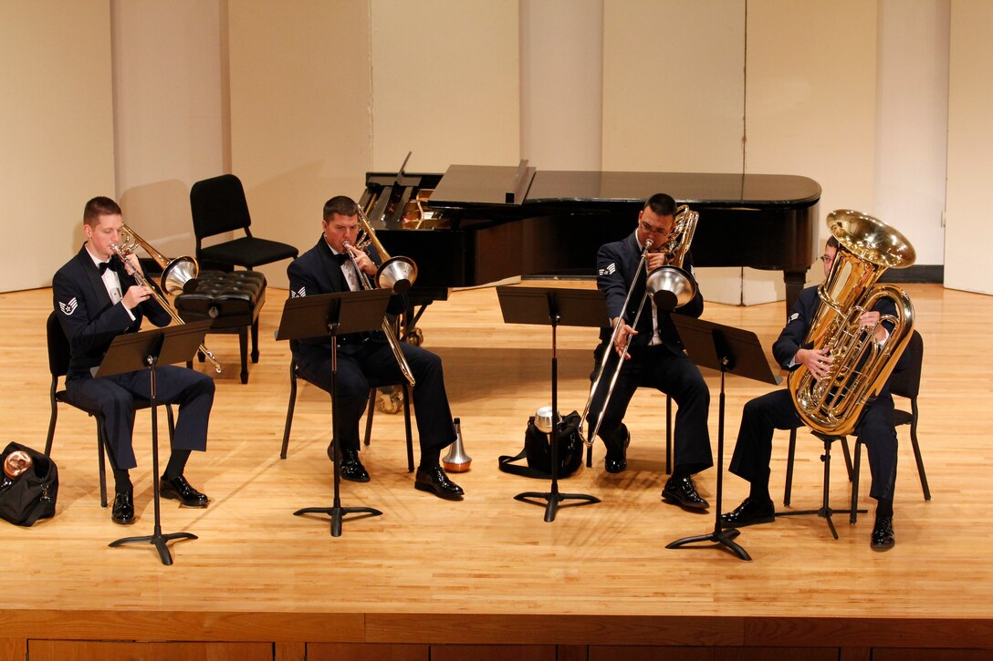 Members of the Band of Flight’s chamber players present a work for low brass quartet. (U.S. Air Force photo/Technical Sergeant Leo Smith)