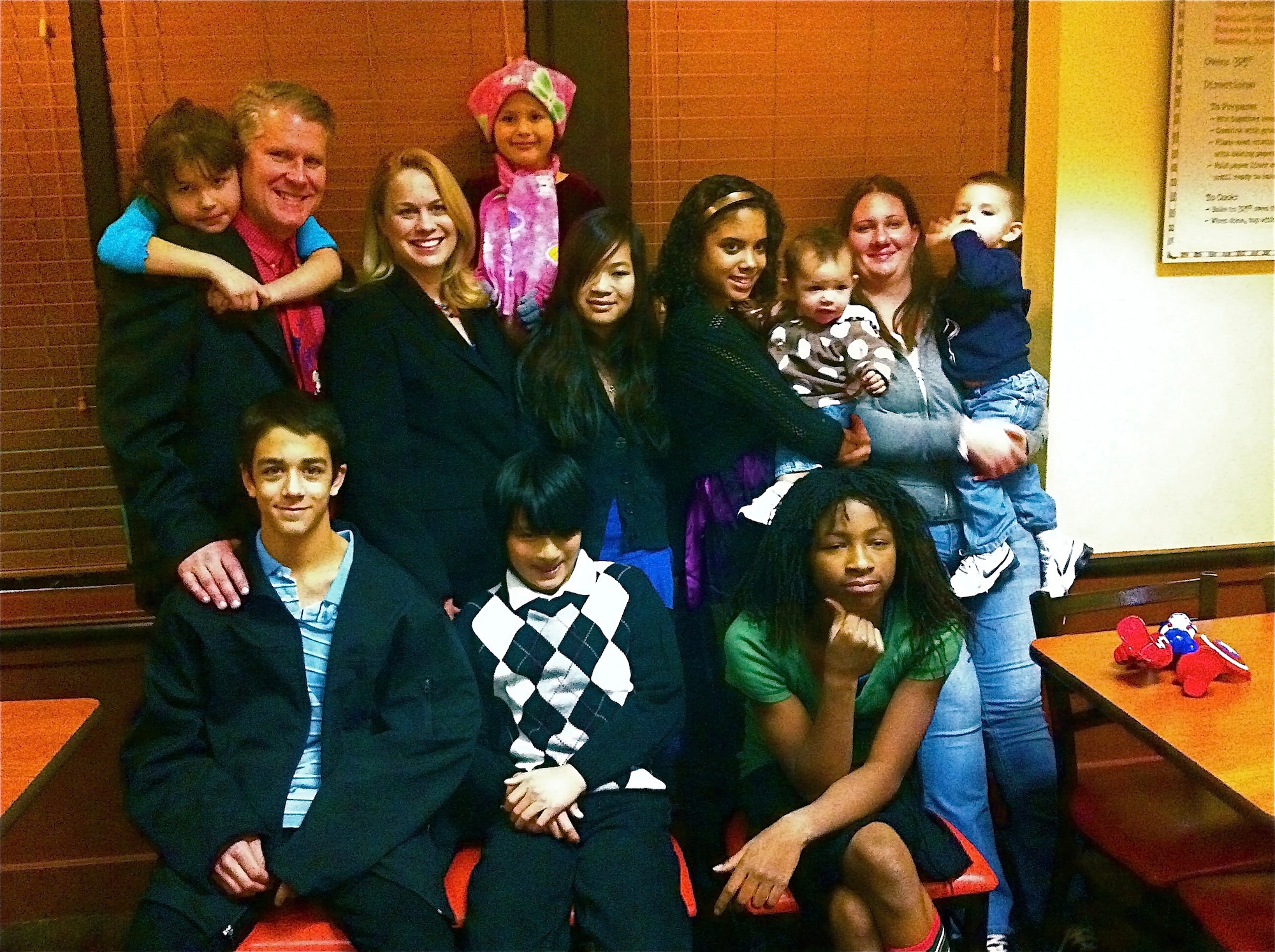 Lt. Col. Chris Padbury, an individual mobilization augmentee, enjoys spending time with his wife, children and grandchildren during Christmas. (left to right) Back row, Liliana, Lt Col Padbury, Sarah, Claudia, Hannah, Mariah, Anaye, Carmelita, Manuelito. Front row  Ethan, Jacob, Jalaya. Padbuy and his wife, Sarah, adopted six children. 