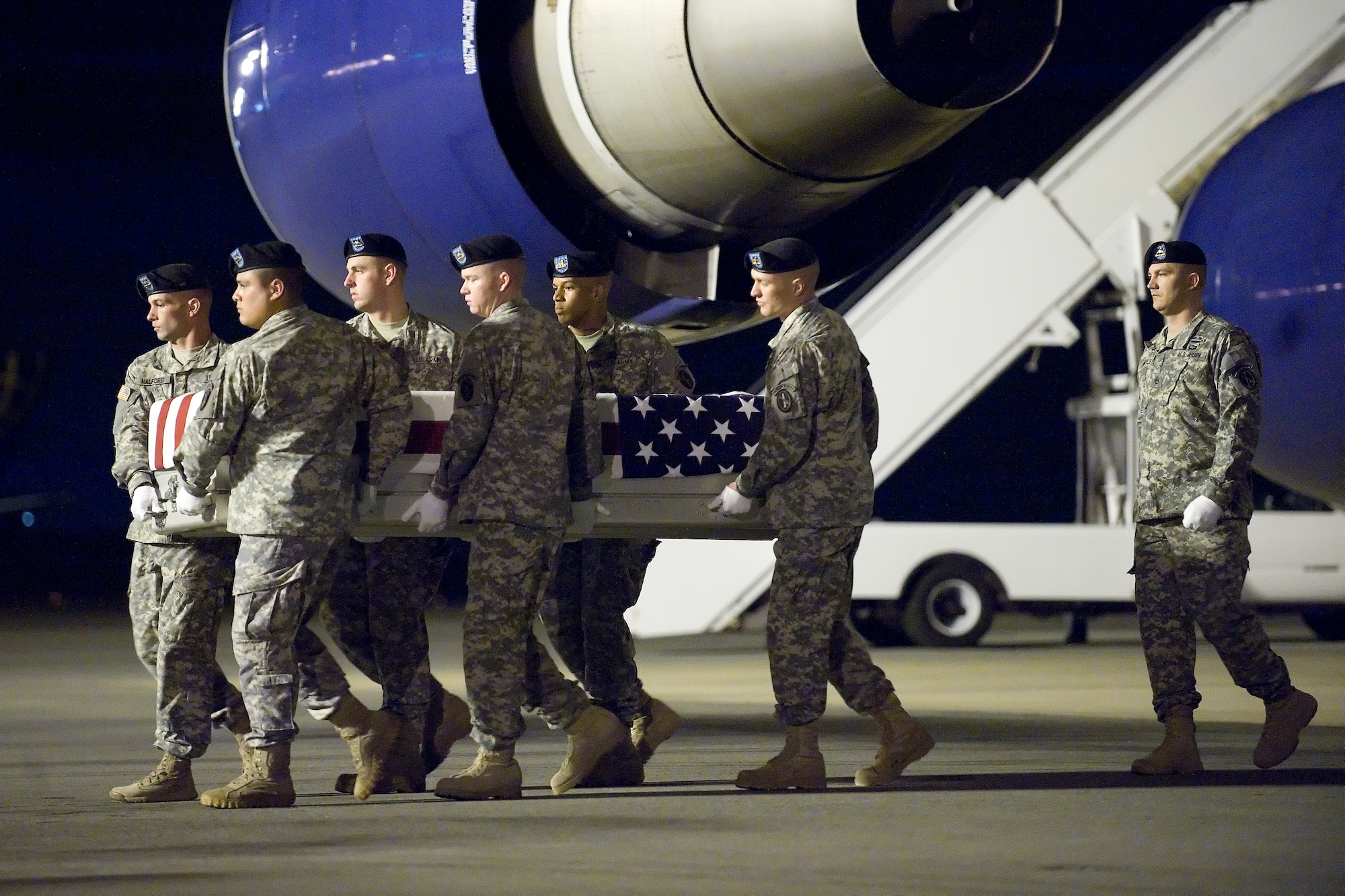 A U.S. Army carry team transfers the remains of Army Sgt. Clinton K. Ruiz of Murrietta, Calif., at Dover Air Force Base, Del., Oct. 27, 2012. Ruiz was assigned to the 9th Military Information Support Battalion (Airborne), 8th Military Information Support Group (Airborne), Fort Bragg, N.C. (U.S. Air Force photo/Adrian R. Rowan)