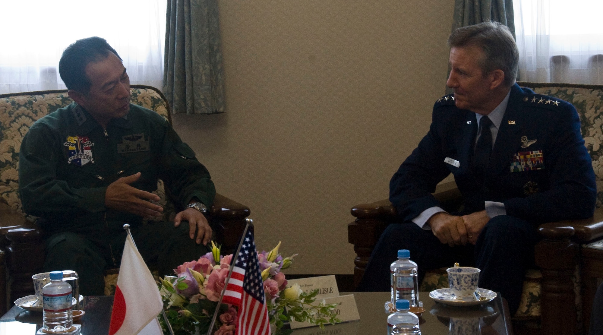 U.S. Air Force Gen. Herbert Carlisle, right, Pacific Air Forces commander, speaks to Lt. Gen. Hideo Wakabayashi, left, Northern Air Defense Force commander, at Misawa Air Base, Japan, Oct. 25, 2012. During Carlisle's visit, he spoke about various issues including the recent curfew of bases in U.S. Pacific Command. (U.S. Air Force photo/Airman 1st Class Kenna Jackson)

