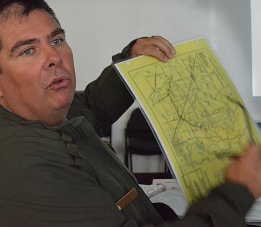 Phil Smith, park manager for the U.S. Army Corps of Engineers Sacramento District’s Hensley Lake, discusses the plan for a potential flood emergency response with state and local partners during a tabletop exercise in Madera, Calif. The simulation brought together representatives from the Corps, Madera County Sheriff’s Department and California Highway Patrol along with firefighters and other first responders and local agencies from throughout the San Joaquin Valley.