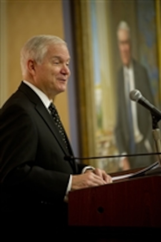 Former Secretary of Defense Robert M. Gates addresses audience members at his portrait unveiling ceremony at the Pentagon on Oct. 29, 2012.  Gates was the 22nd secretary of defense.  