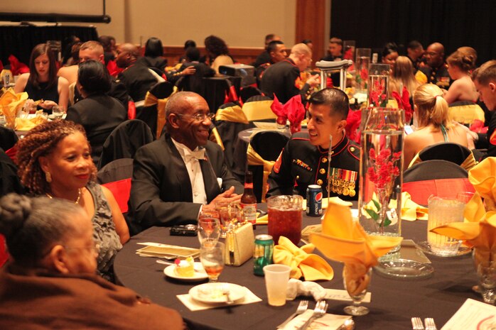 Guests socialize during 2nd Supply Battalion, Combat Logistics Regiment 25, 2nd Marine Logistics Group’s Marine Corps Birthday ball in New Bern, N.C., where several members of the Montford Point Marines joined the unit Oct. 29, 2012. The battalion invited the Montford Point Marines to celebrate their role in the unit’s history and to honor the Marine Corps’ 237th birthday. 