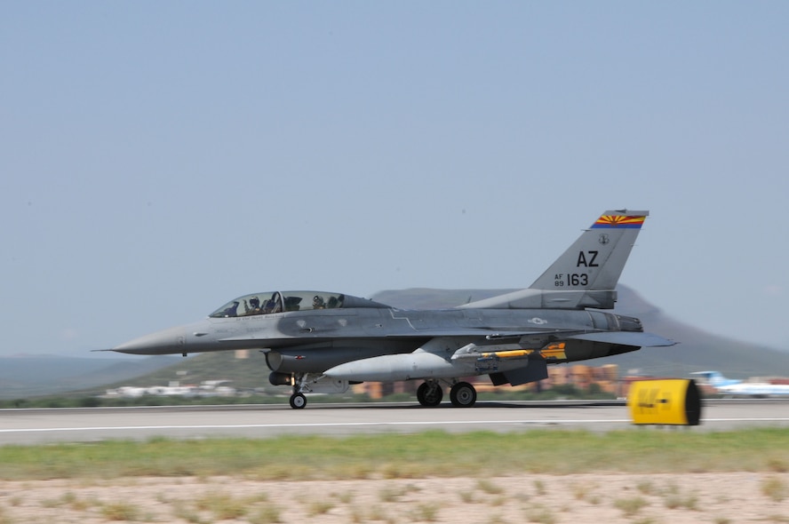 Col. Andrew MacDonald, 162nd Operations Group commander, takes off with Iraqi Air Force Brig. Gen. Abdulhussein Lafta Ali Ali in an F-16D Fighting Falcon for an orientation flight at Tucson International Airport Aug. 30. Abdulhussein, with a delegation of senior Iraqi officers, visited the international F-16 training wing where Iraqi pilots are learning to fly the multirole fighter. (U.S. Air Force photo/Maj. Gabe Johnson)