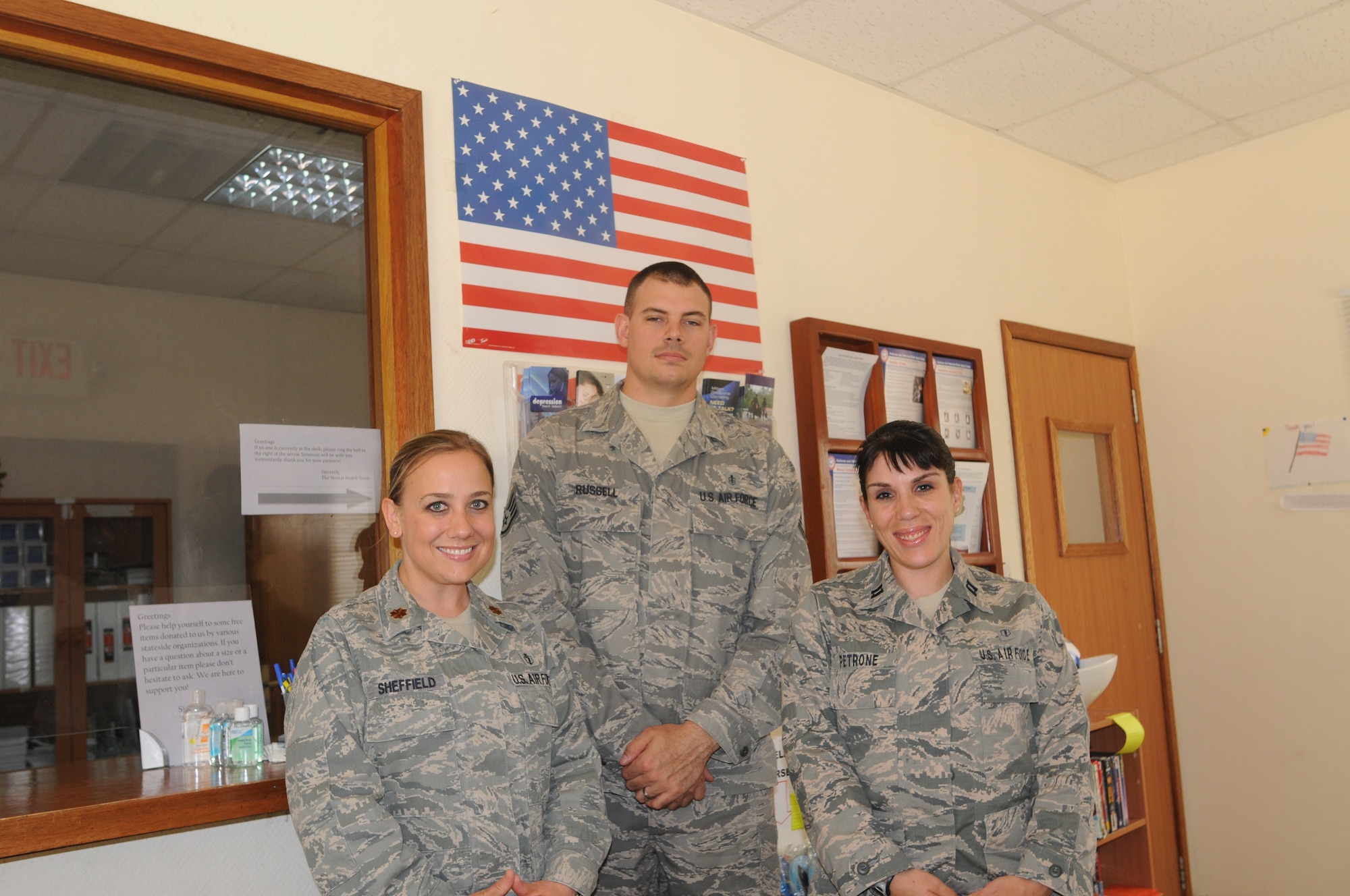 (left to right) Maj. Jennie Sheffield, 379th Medical Group Mental Health officer in charge, Staff Sgt. Michael Russell, 379th MDG Mental Health technician, and Capt. Julianna Petrone, 379th MDG Mental Health clinical social worker, make up the team who offer a multitude of services to deal with deployment stresses. The mental health team offers individual appointments, outreach consultations for groups and units, response to traumatic stress, and prevention services centering on improving the quality of sleep, managing anger, and overall stress management. (U.S. Air Force photo/Capt. Craig T. Carper)