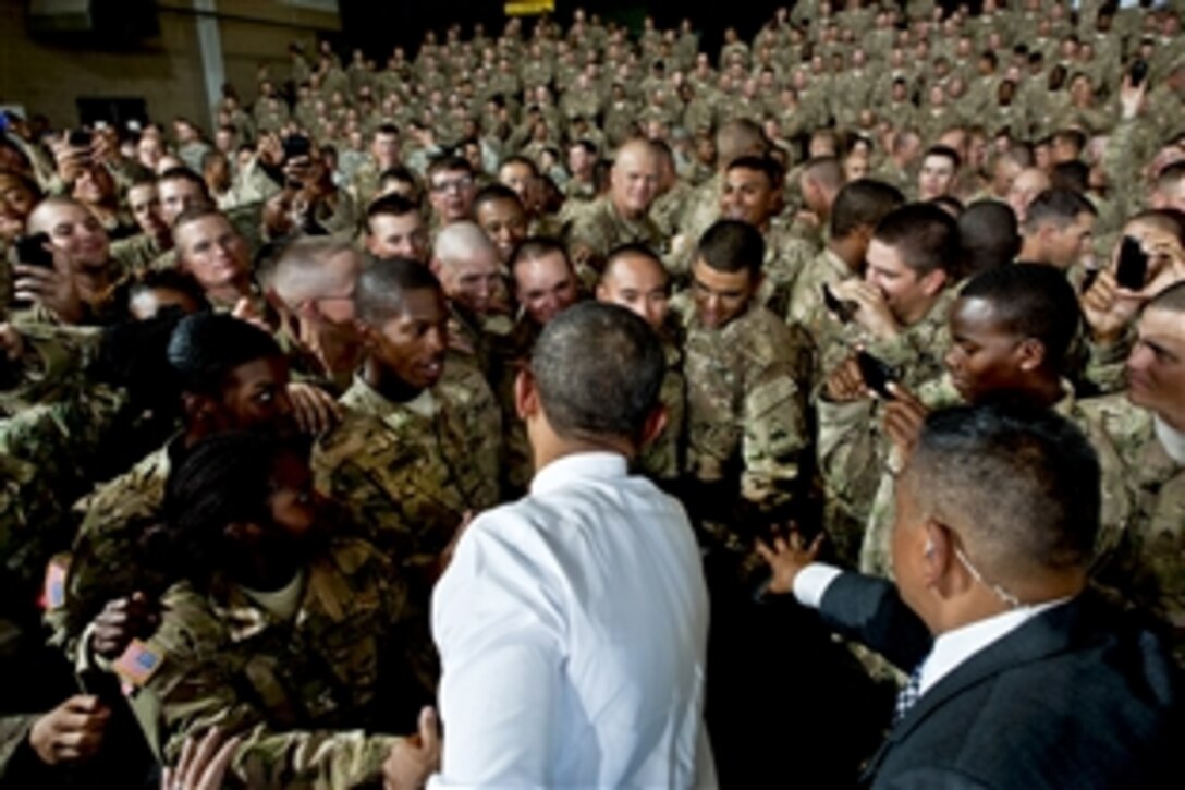 President Barack Obama greets soldiers during a visit to Fort Bliss, Texas, Aug. 31, 2012.