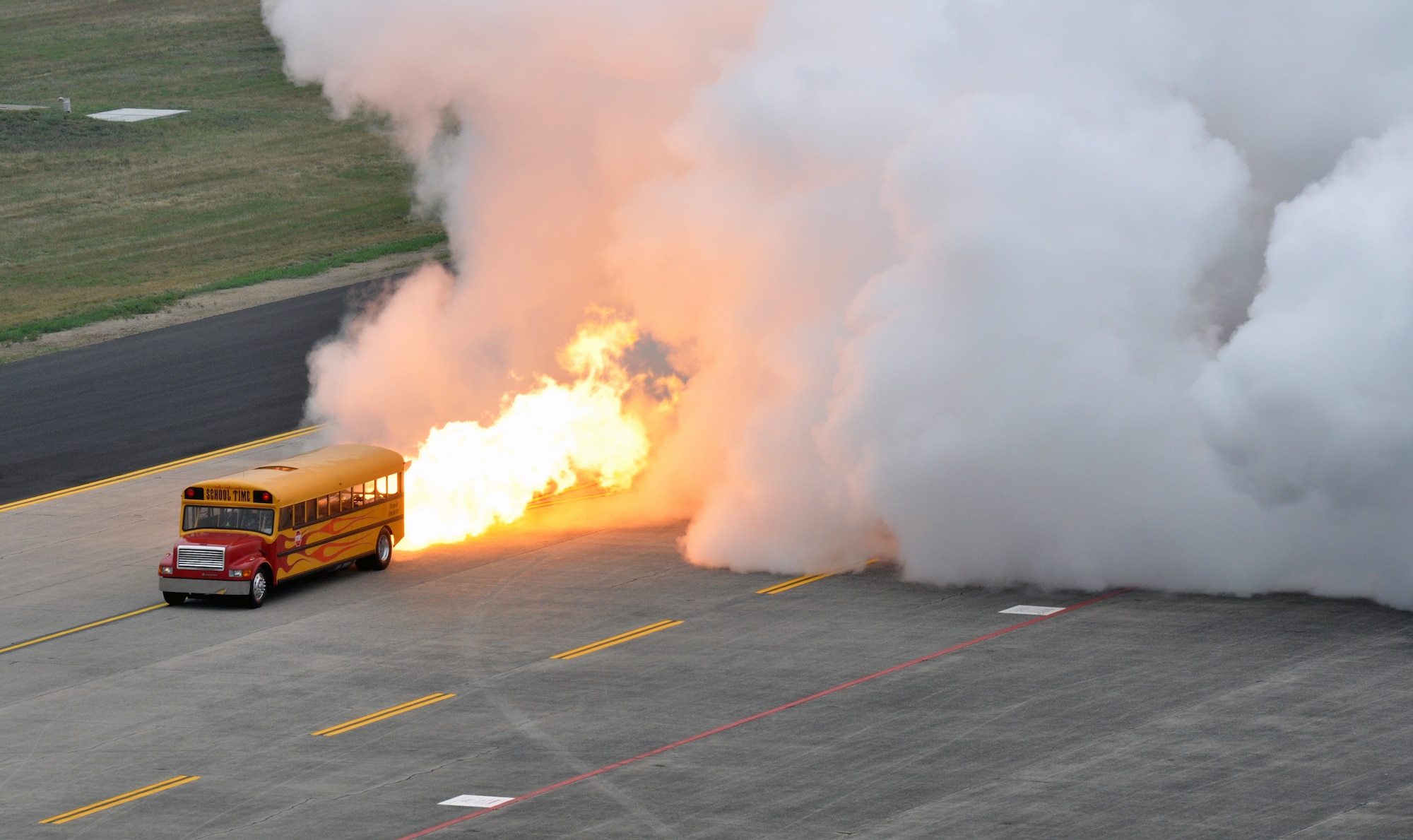 Barreling down a flight line at 300 mph, in a school bus, isn't your everyday activity. (U.S. Air Force photo by SrA. Kelly Galloway)