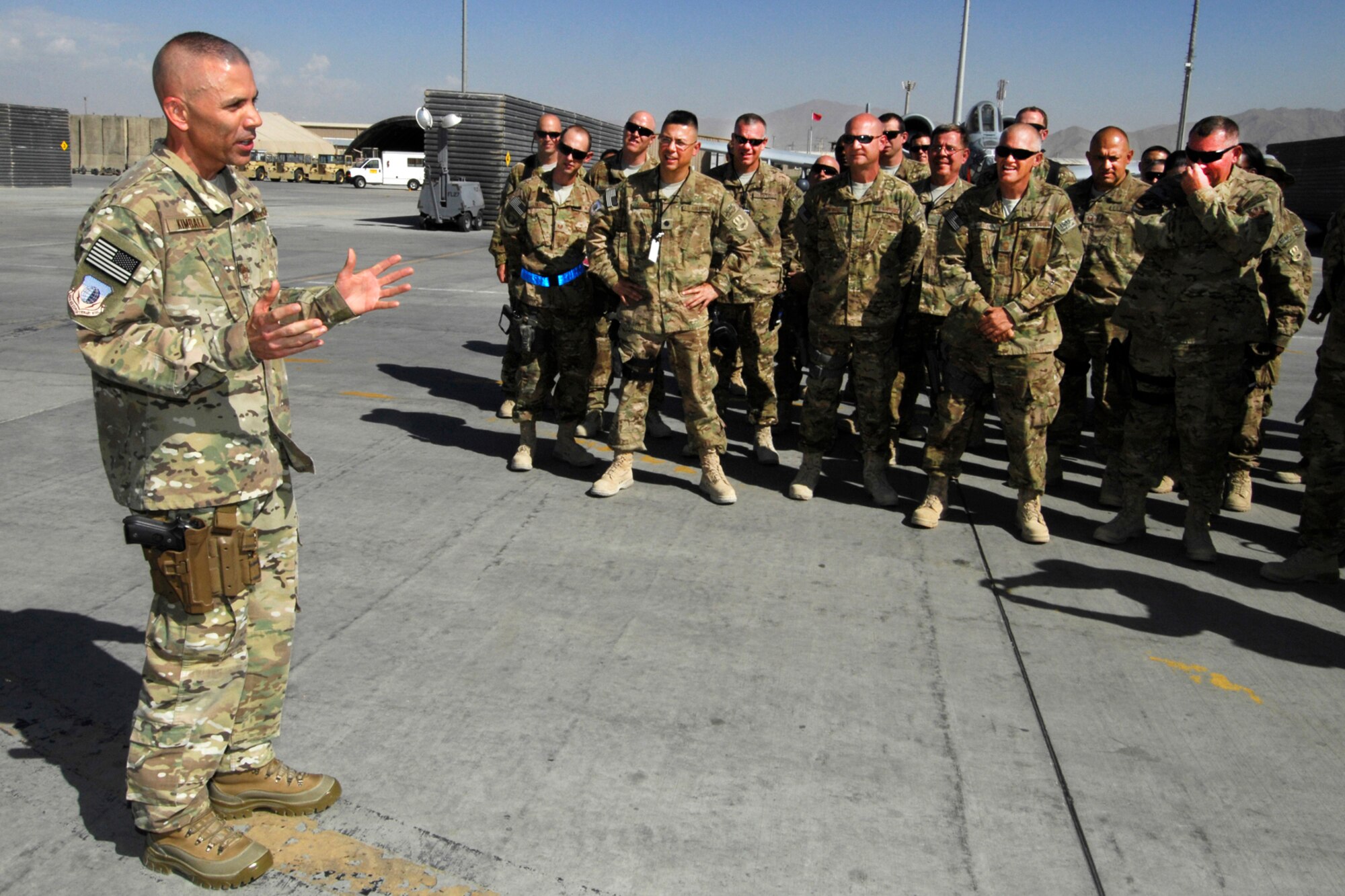 CMSgt Bruce Kimball, 455th Expeditionary Maintenance Squadron First Sergeant, addresses personnel from his squadron after being promoted to Chief at Bagram Airfield, Afghanistan, Aug. 31, 2012. Kimball, from Bridgton, Maine, spoke briefly about his 26-year career and thanked leadership and members of his unit for their support throughout his deployment. (U.S. Air Force photo/SSgt Jeff Nevison)