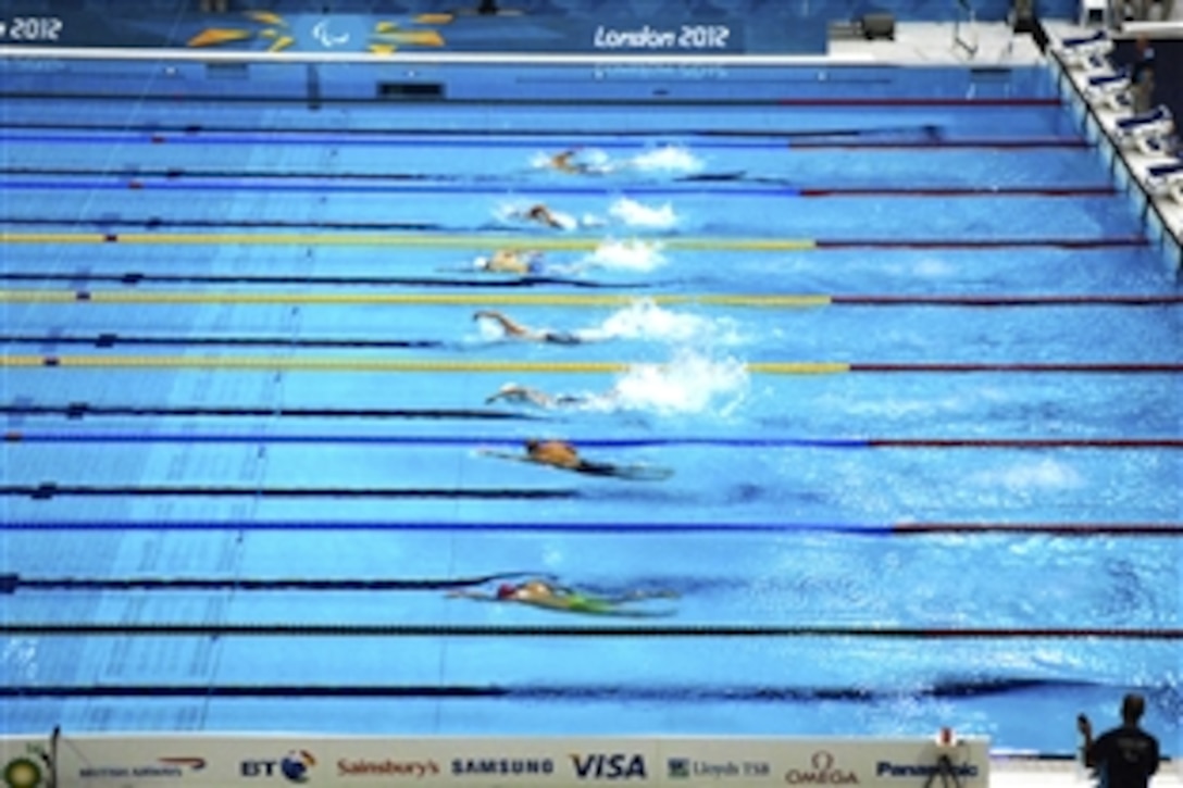 U.S. Navy Lt. Bradley Snyder, fifth lane from the top, swims as he competes in the qualifying round of the 100-meter freestyle swim event during the 2012 Paralympic Games in London, Aug. 30, 2012. Snyder won the event with a Paralympic record time of 57.18 seconds. 