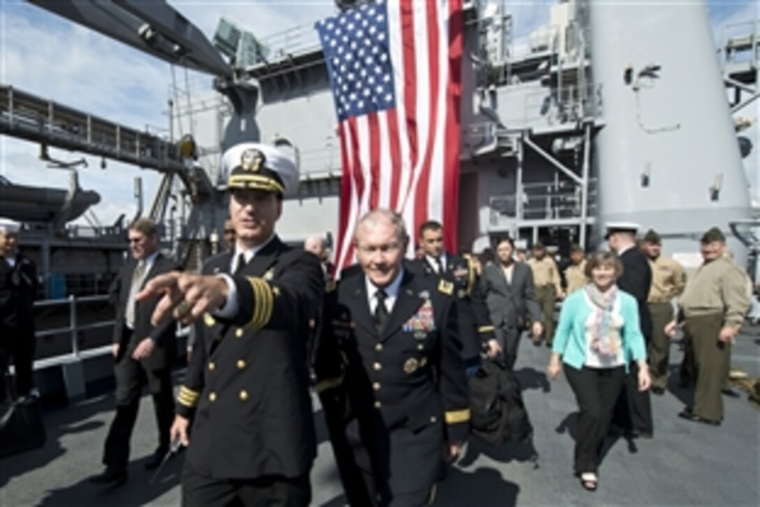 USS Fort McHenry Commander Ray Hartman provides a tour of the ship to U.S. Army Gen. Martin E. Dempsey, chairman of the Joint Chiefs of Staff, during its port visit in Dublin, Sept. 1, 2012. 