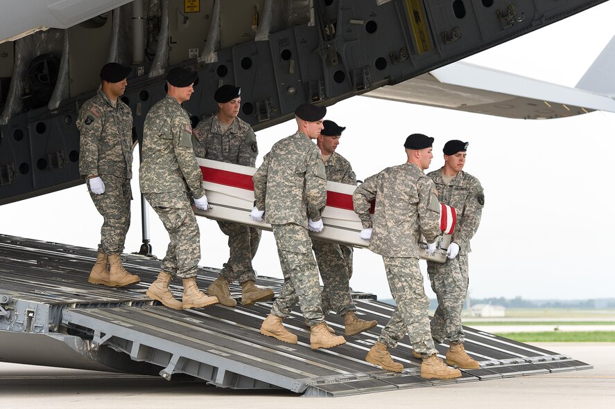 A U.S. Army carry team transfers the remains of Army Staff Sgt. Jeremie S. Border, of Mesquite, Texas, at Dover Air Force Base, Del., Sept. 3, 2012. (U.S. Air Force photo/Roland Balik)