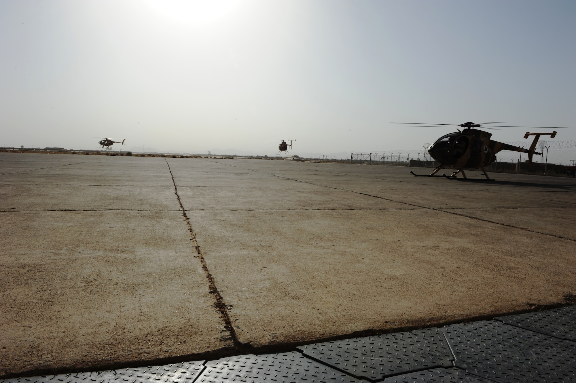 Afghan Air Force students take to the skies Aug. 29, 2012 at Shindand AB, Afghanistan. The students are part of class 91-02, the second AAF class to begin undergraduate helicopter training at Shindand AB, Afghanistan. All four students and instructors had successful training flights. (U.S. Air Force photo by Melissa K. Mekpongsatorn)