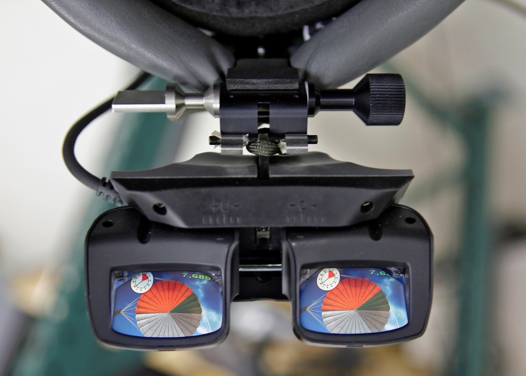 Graphic representation of what an aircrew member will see when operating the new Parasim virtual reality parachute simulator during hanging harness training. (U.S. Air Force graphic by Jet Fabara)