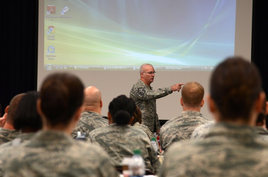 SHAW AIR FORCE BASE, S.C. - Senior Master Sgt. Maury Turner, 20th Logistics Readiness Squadron first sergeant briefs attendees of a first sergeant symposium here Aug. 30. The symposium was attended by 103 NCO's from the around the Air Force that were interested in becoming a first sergeant or are currently assigned the first sergeant tasks as an additional duty. (U.S.  Air Force photo by Master Sgt. Cohen A. Young/Released)