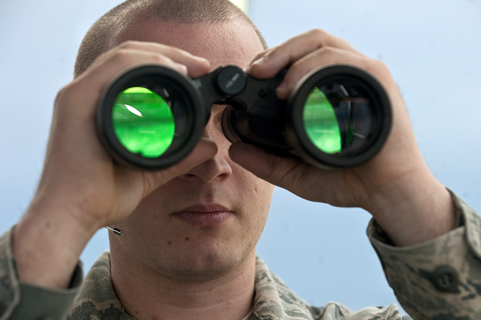 Airman 1st Class Joshua Gallipoli, 57th Operations Support Squadron air traffic controller, scans the flightline prior to a take off Aug. 31, 2012, at Nellis Air Force Base, Nev. All ATC specialists must maintain a Federal Aviation Administration Specialist certificate to remain qualified. (U.S. Air Force photo by Staff Sgt. Christopher Hubenthal)



