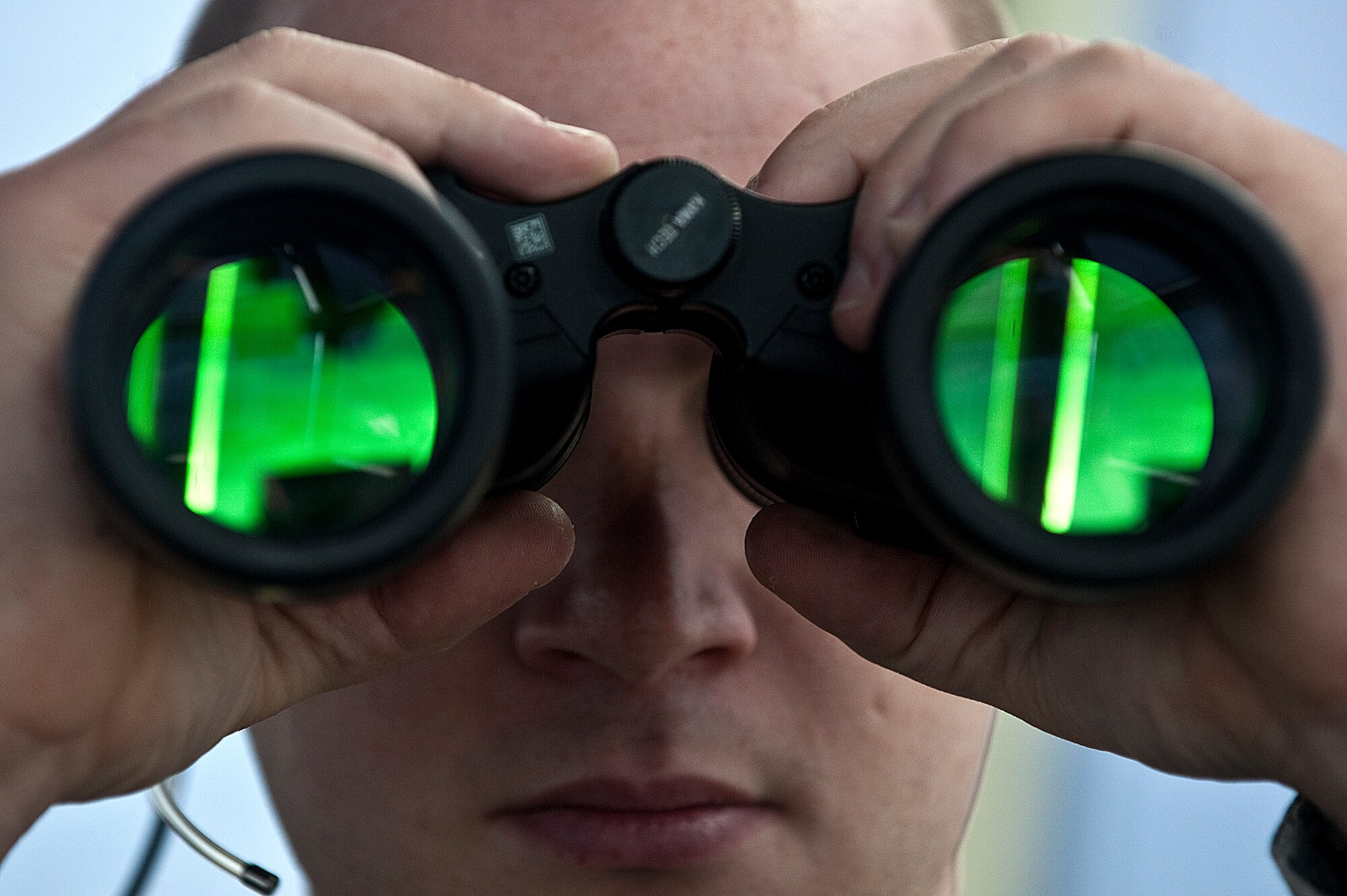 Airman 1st Class Joshua Gallipoli, 57th Operations Support Squadron air traffic controller, scans the flightline prior to a take off Aug. 31, 2012, at Nellis Air Force Base, Nev. All ATC specialists must maintain a Federal Aviation Administration Specialist certificate to remain qualified. (U.S. Air Force photo by Staff Sgt. Christopher Hubenthal)
