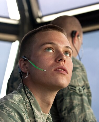 Airman 1st Class Patrick Skogen, 57th Operations Support Squadron air traffic controller, reads data on a screen to determine locations of aircraft at the control tower Aug. 31, 2012, at Nellis Air Force Base, Nev. ATC specialists can deploy or be stationed at any airfield in the world in support of base operations. (U.S. Air Force photo by Staff Sgt. Christopher Hubenthal)