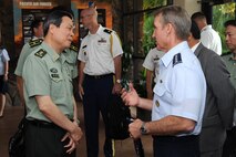 Gen. Herbert J. “Hawk” Carlisle, Pacific Air Forces commander, explains the history of PACAF to Lt. Gen. Cai Yingting, Deputy Chief of the General Staff of the Chinese People's Liberation Army, at the Courtyard of Heroes, Headquarters PACAF, Joint Base Pearl Harbor-Hickam, Hawaii, Aug. 27, 2012. Cai visited Hawaii to discuss issues of mutual interest with senior military and defense leaders. (U.S. Air Force Photo/Tech. Sgt. Jerome S. Tayborn)