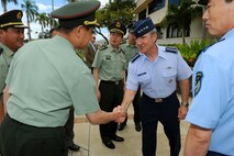 Gen. Herbert J. “Hawk” Carlisle, Pacific Air Forces commander, welcomes Chinese People's Liberation Army delegation members visiting with Lt. Gen. Cai Yingting, Deputy Chief of the General Staff of the PLA, at PACAF headquarters, Joint Base Pearl Harbor-Hickam, Hawaii, Aug. 27, 2012. Cai and his delegation visited Hawaii to discuss issues of mutual interest with senior military and defense leaders. (U.S. Air Force Photo/Tech. Sgt. Jerome S. Tayborn) 