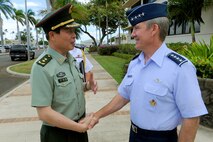 Lt. Gen. Cai Yingting, Deputy Chief of the General Staff of the Chinese People's Liberation Army, is greeted by Gen. Herbert J. “Hawk” Carlisle, Pacific Air Forces commander, at PACAF headquarters, Joint Base Pearl Harbor-Hickam, Hawaii, Aug. 27, 2012. Cai visited Hawaii to discuss issues of mutual interest with senior military and defense leaders. (U.S. Air Force Photo/Tech. Sgt. Jerome S. Tayborn)