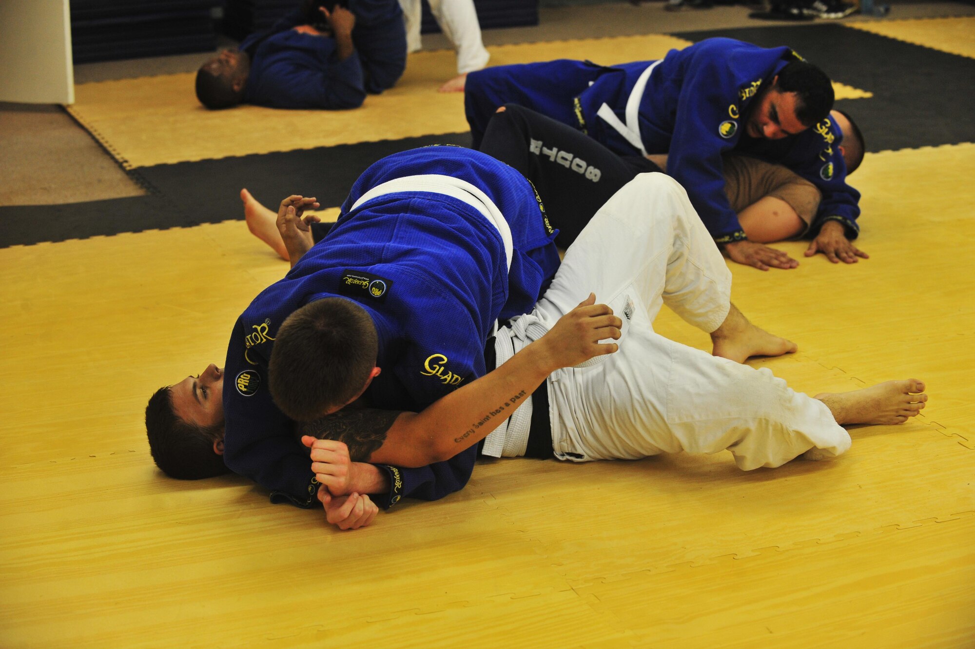 Students from the Keishidojo Martial Arts and Fitness Center work on combative techniques in Sumter, S.C., Aug. 21, 2012. Taking these classes increase circulation and help to sculpt the body and strengthen the body's "core .several military members training with the center. (U.S. Air Force photo by Airman 1st Class Ashley L. Gardner/ Released)