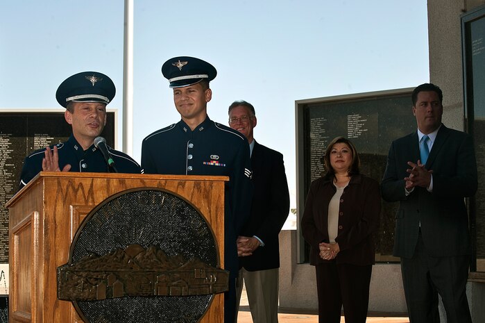 Master Sgt. Jon Linker, Air Force Band of the Golden West trumpet player, and Senior Airman Caleb Brinkley, Air Force Band of the Golden West saxaphone player, discuss their participation in the upcoming 12th Hispanic International Day Parade and Festival during a press conference at the Henderson Veteran Memorial Aug. 29, 2012, in Henderson, Nev. The 12th Hispanic International Day Parade is dedicated to the returning military troops Oct. 13, 2012. (U.S. Air Force photo by Staff Sgt. Christopher Hubenthal)