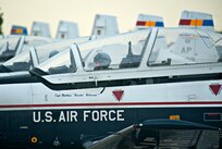 T-6 Texan IIs from the 479th Flying Training Group at Naval Air Station Pensacola, Fla., line the south ramp at Joint Base San Antonio-Randolph, Texas prior to their departure for their home station, August 31, 2012.  The aircraft had evacuated to JBSA-Randolph in anticipation of Hurricane Isaac. (U.S. Air Force photo by Benjamin Faske)