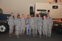 MINOT AIR FORCE BASE, N.D. -- The 5th Logistics Readiness Squadron Vehicle Operations Control Center, is a 61-person shop & a critical piece of the Team Minot puzzle. They manage a $15 million vehicle fleet of 199 Government Motor Vehicles, providing customer service to 2 wings. The VOCC also manages 3 installation programs (GMV Licensing, GMV Misuse & Training Validation & Operations). Additionally, they play a large role in the Installation Deployment Machine & have their hands in everything from Distinguished Visitor support to wrecker runs. In this photo taken at 5:30 a.m., the VOCC had already loaded 6 tractor trailer combinations with 12 HMMWVs, given their convoy brief and are headed out for a road trip to Montana. The convoy team started the 3-day operation on Aug. 27 and moved 13 HMMWVs as part of a 33 HMMWV command-leveling initiative, saving the Air Force $80,000 in commercial shipping costs. (U.S. Air Force photo/Senior Airman Brittany Y. Auld)