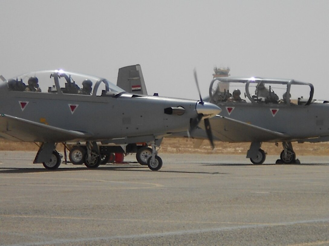 Iraqi student pilots prepare their T-6 Texan II aircraft for takeoff at the Al Sahra Airfield in Tikrit, Iraq. The T-6 is one of the final planes Iraqi pilots will train on before their flight training is complete. (Contributed photo) 